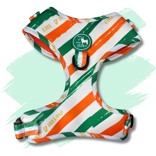 Dog harness featuring green white and orange stripes representing Irish flag and featuring the name Ireland Éire and the harp.