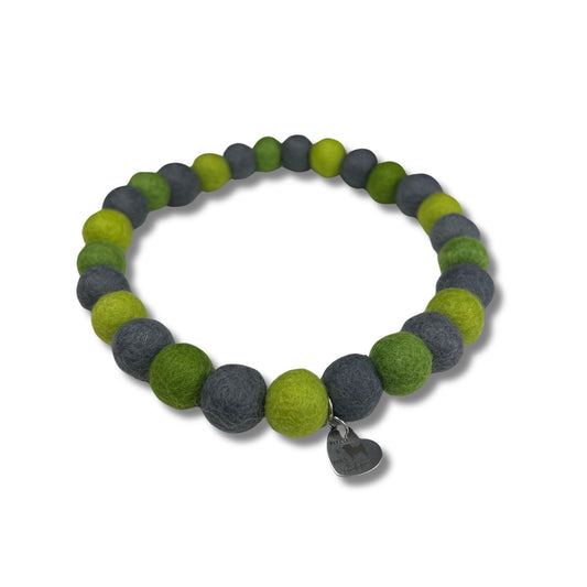 Dog pom pom necklace made of two shades of green and grey wool felt balls perfect for St. Patrick's Day.